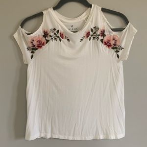white shirt with floral detail